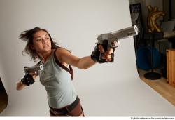 Woman Adult Average Fighting with gun Standing poses Casual Latino